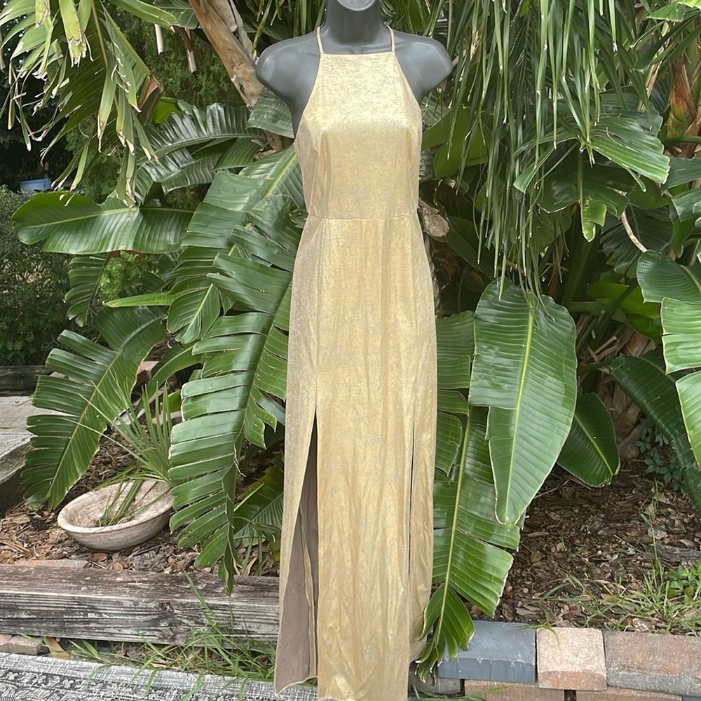 metallic gold gown with double front slit from h by Halston